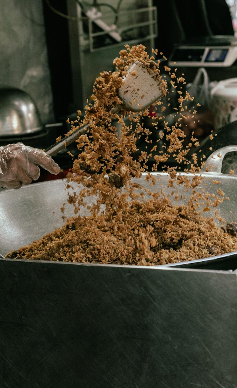 Proses memasak nasi goreng kambing NasGorKam BonSir